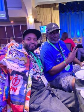 PFFC Members Qaddir El Amin and Luther Lacy enjoying lunch at the conference.